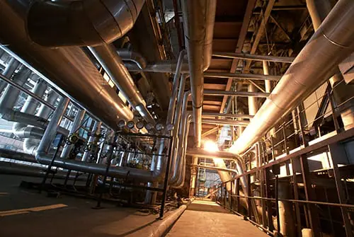 Equipment-cables-and-piping-as-found-inside-of-a-modern-industrial-power-plant-_k2432656